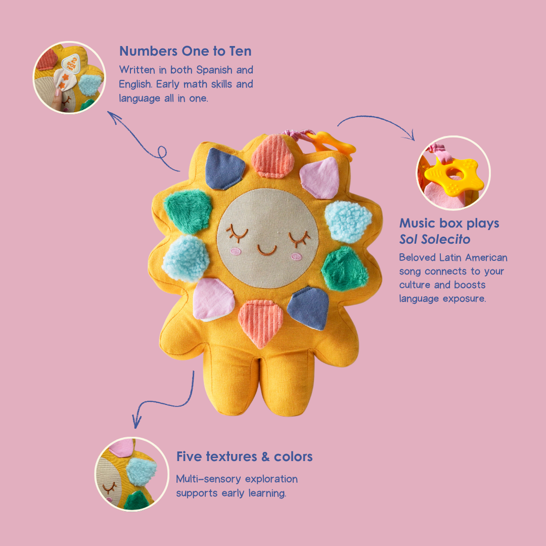 Sun-shaped plush toy with colorful accents on a pink background, featuring text about educational features.